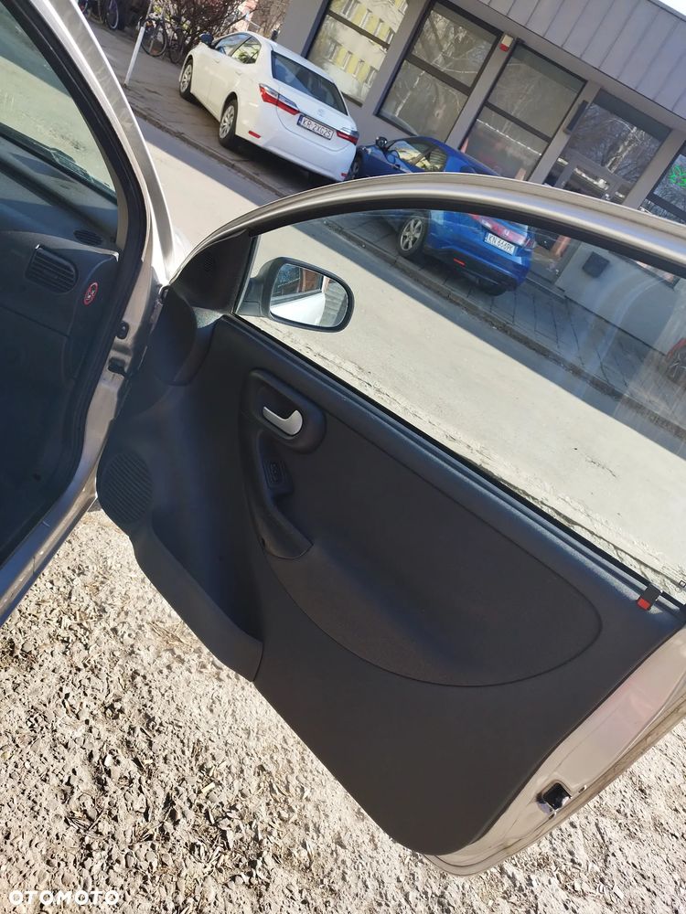 Opel Corsa 1.2 16V Cosmo - 13