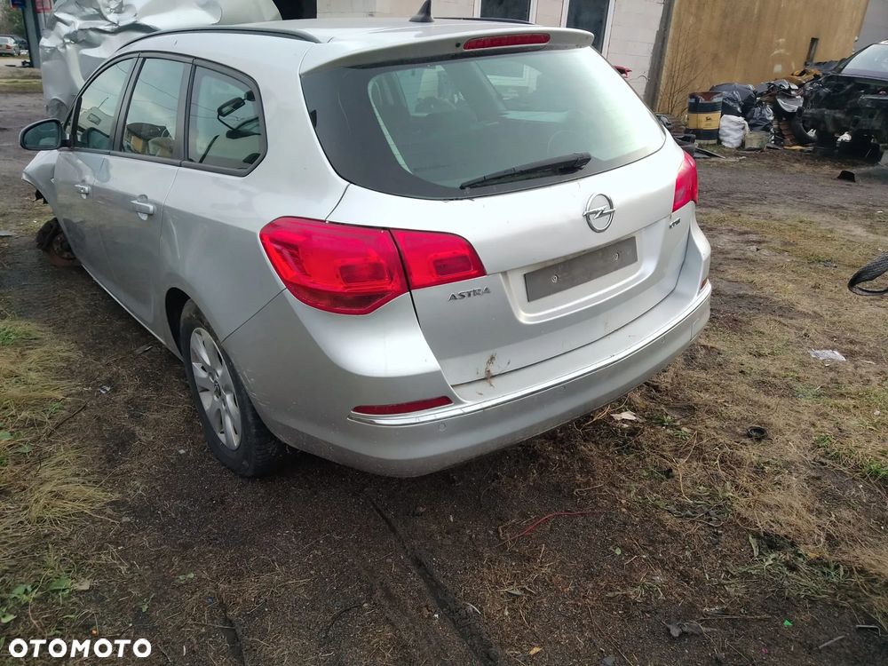 z176 lampa cwiartka tył błotnik drzwi astra j 09-15r części - 2