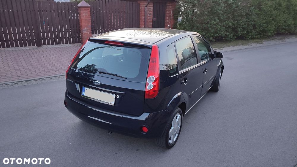 Ford Fiesta 1.4 Ghia - 5