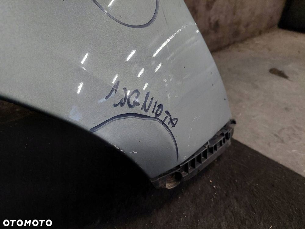 BŁOTNIK PRAWY PRZÓD TOYOTA YARIS II LIFT 1F8 - 2