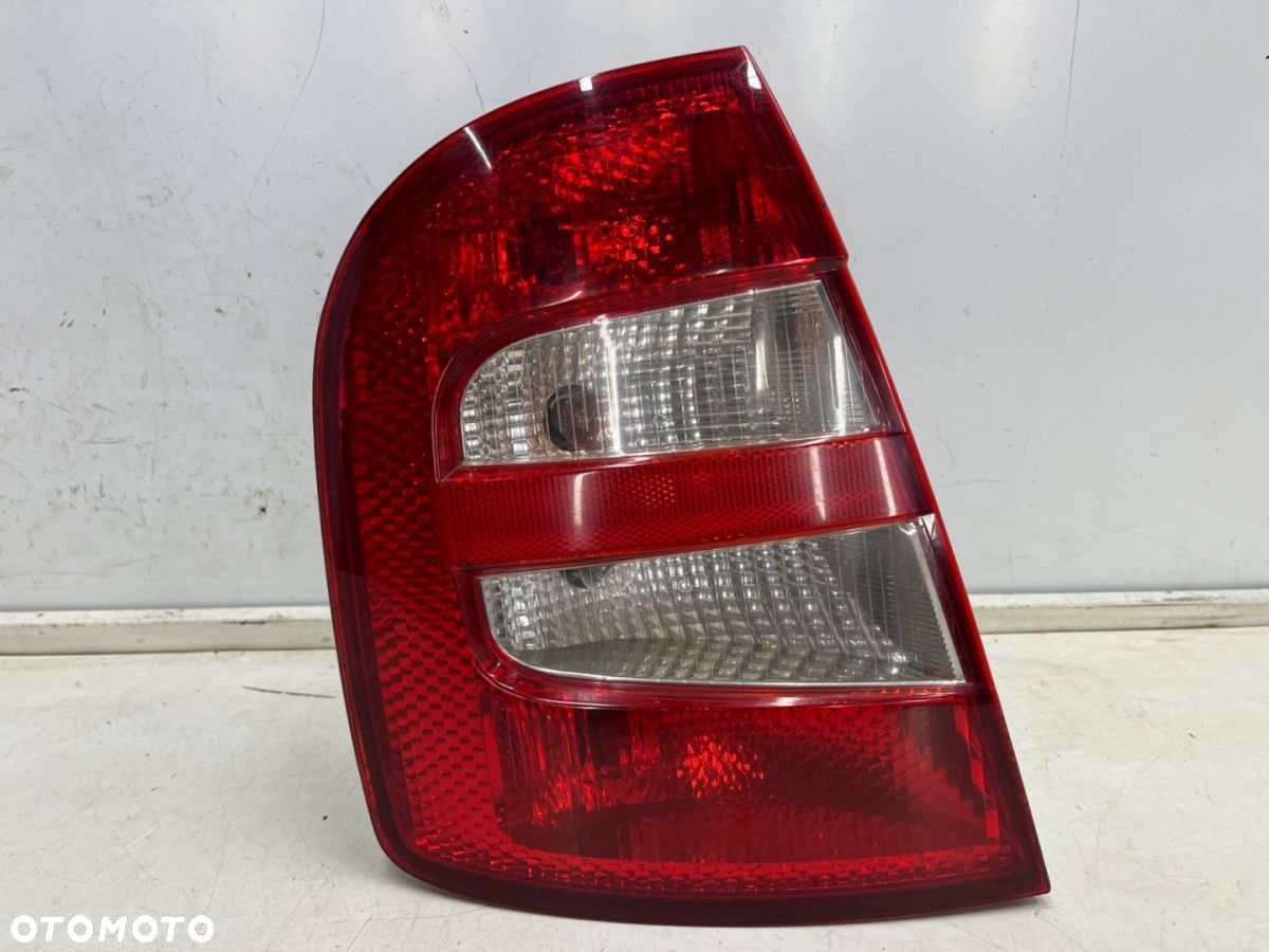 Lampa Skoda Fabia I 6y HB 99-08r. LEWA tylna w błotnik EUROPA EU oryginalna lewy tył 6y6945095b - 1
