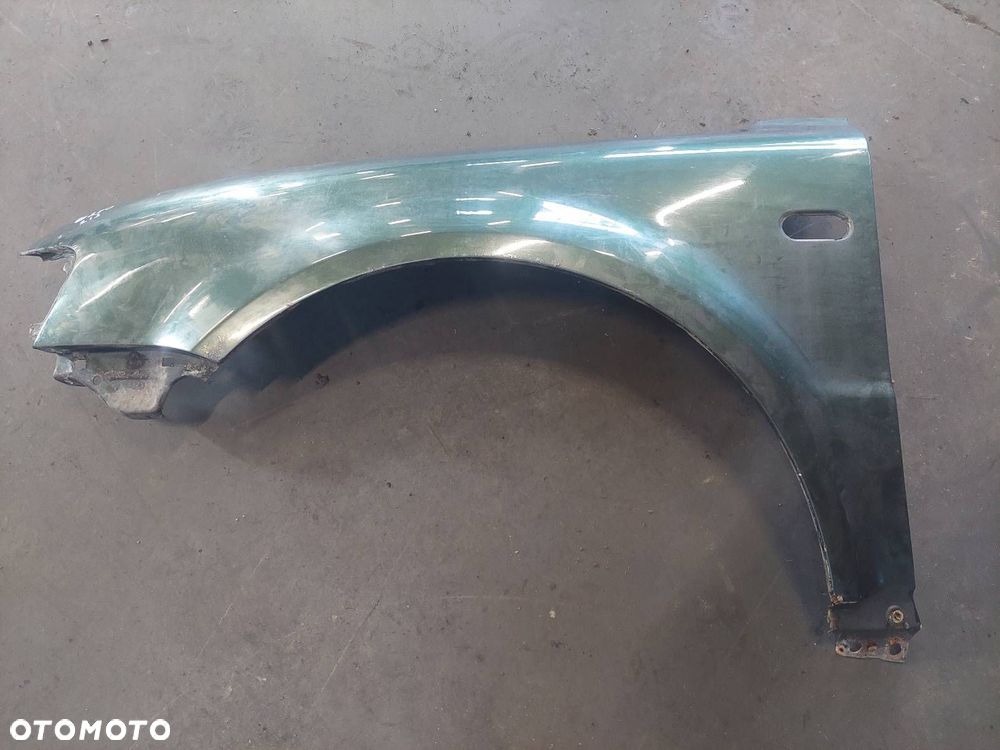 BŁOTNIK LEWY PRZÓD VOLKSWAGEN PASSAT B5 LC6N - 1