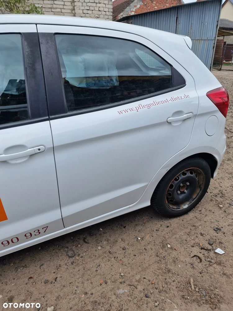 Drzwi  lewy tył ford  ka plus  lift  w  kolorze  KAF - 1