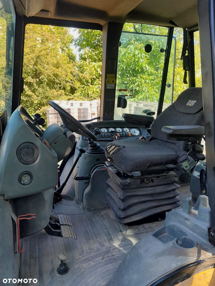 Caterpillar CAT 428D - 7