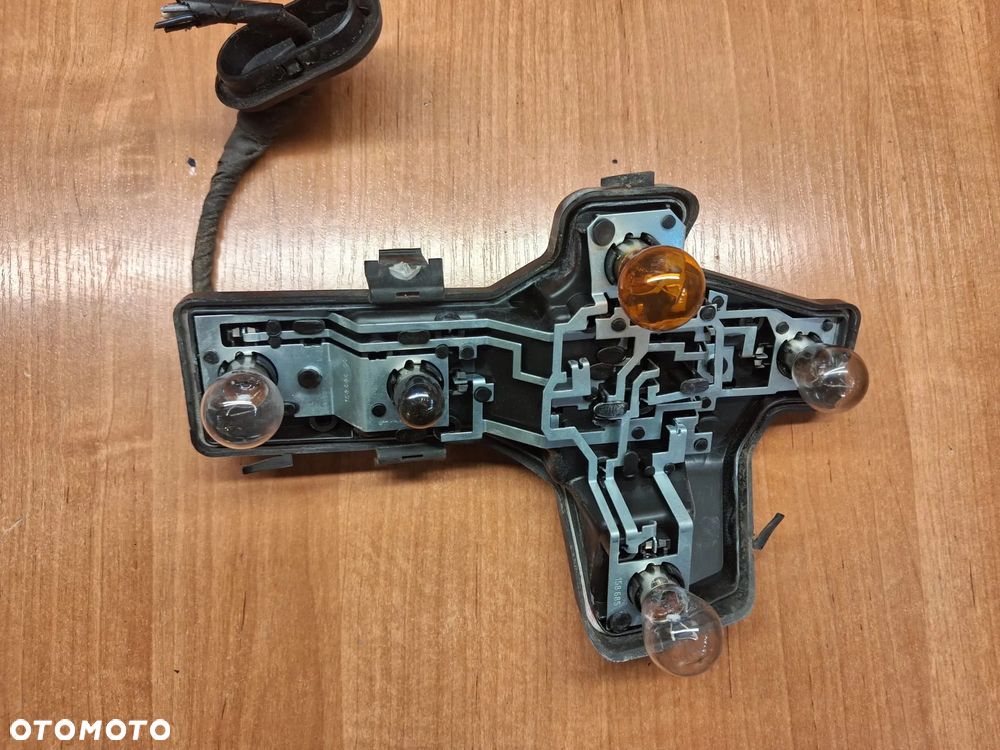 Wkład lampy VW TOURAN I prawy lewy tył 1T0945257A   1T0945258A  OE - 1