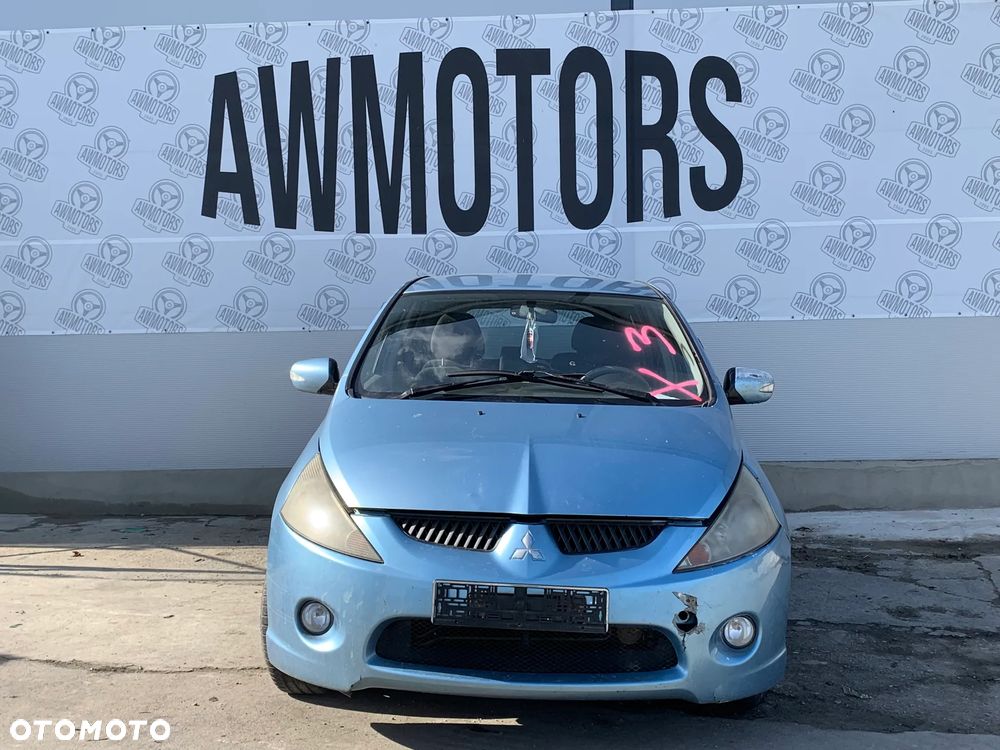MITSUBISHI GRANDIS 2005 *SAMOCHÓD NA CZĘŚCI*  MASKA, LAMPA, DRZWI, LUSTERKO, ZDERZAK, GRILL, BŁOTNIK, KLAPA, BELKA, DESKA, FOTELE, KANAPA, ĆWIARTKA, KIEROWNICA, TARCZE, ZACISKI, ZAWIESZENIE, KOMPLETNY PRZÓD, KOMPLETNY TYŁ, LICZNIK, ZEGARY, PRAWE LEWE PRZÓD TYŁ - 2