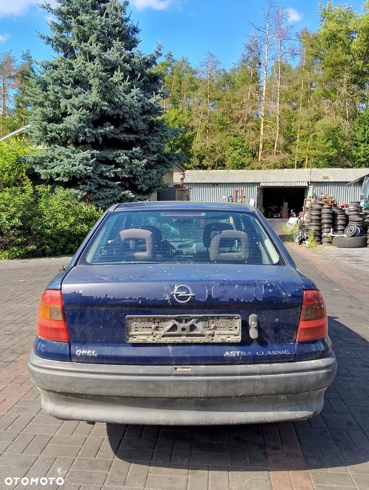 Opel Astra F (94-02r.) 1.6B 74KM. Silnik X16SZR Skrzynia F13 W374.Cały na części. GWARANCJA !!! Przód Tył Zestaw Komplet Drzwi Klapa Zderzak Błotnik Maska Grill Atrapa Szyba Pas Lampa Lusterko Boczki Fotel Kanapa Kokpit Deska Rozdzielcza Przełącznik Włącznik Sterownik Przewody Wiązka Instalacja Moduł Komputer Czujnik Listwa Pompa Alternator Wtryski Głowica Rozrusznik Kompresor Sprzęgło Dwumas Silnik Skrzynia ABS Klimatyzacji Paliwa Wspomagania Kolektor Turbina Przepustnica Zawór Chłodnica Koło Hak Belka Sanki Zawieszenie Mcpherson Półoś Amortyzator Wydech Tłumik Zacisk Most - 3