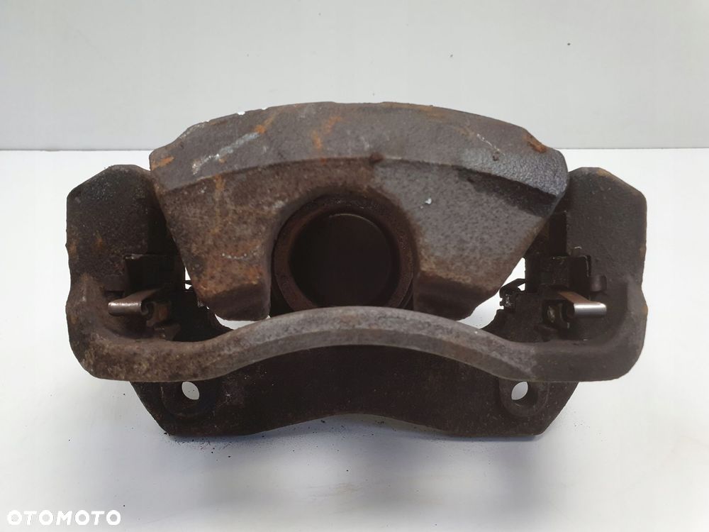 Toyota RAV4 IV III PRZEDNI ZACISK HAMULCOWY lewy przód KIEROWCY 63-28 - 2