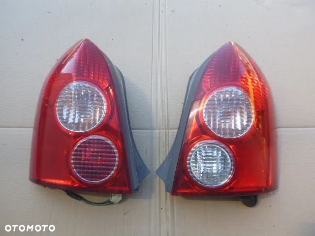 LAMPA LEWY TYŁ PRAWY TYŁ KOMPLET MAZDA 323F LIFT 01-03 - 1