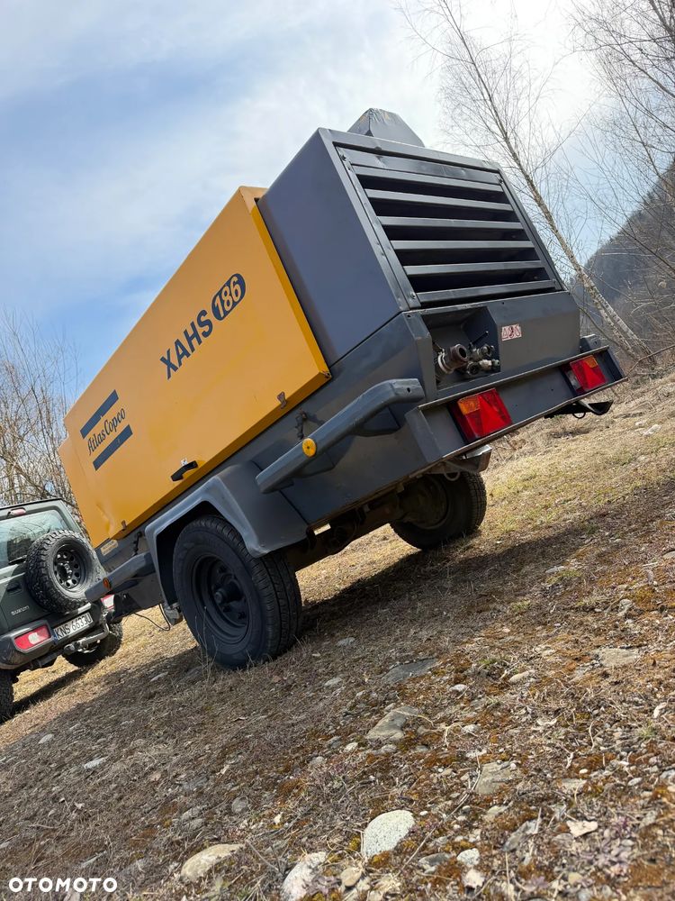 Atlas Copco XAHS 186 Kompresor Śrubowy Sprężarka potężna mocna 11m3. 12 bar regulowanych. Bogata wersja z chłodnicą cyklonową! z Norweskiej Upadłości! Niski Przebieg 1900mtg. 2014rok silnik DEUTZ.150 KM. serwisowany w DEKRA. OKAZJA - 32