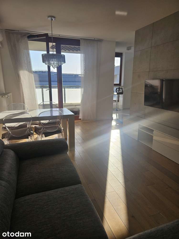 Przestronny apartament 60 m² z tarasem i miejscem garażowym