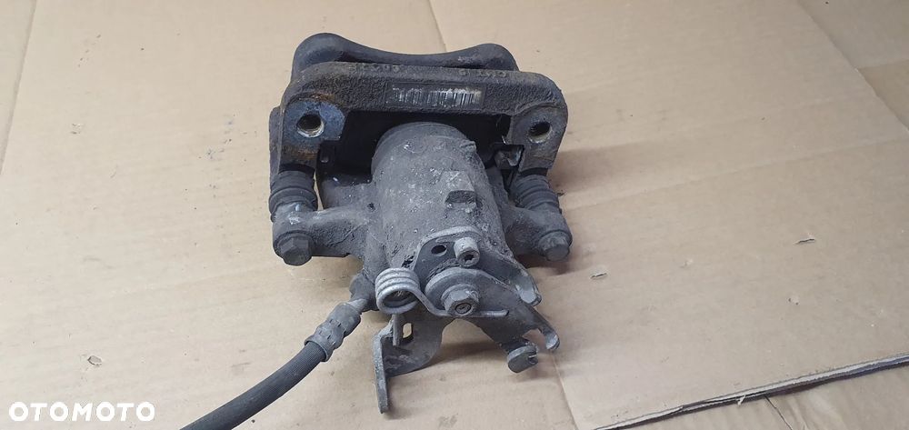 Zacisk hamulcowy prawy tył tylny prawy Opel Insignia A - 7