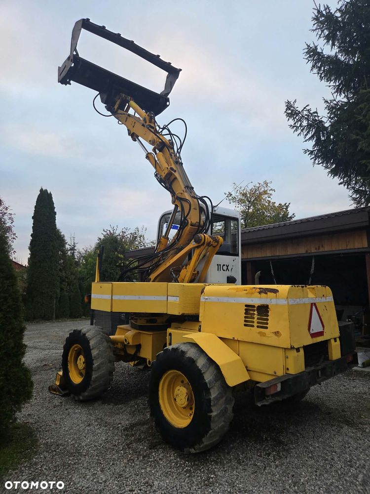 Mecalac 11CX i - 12