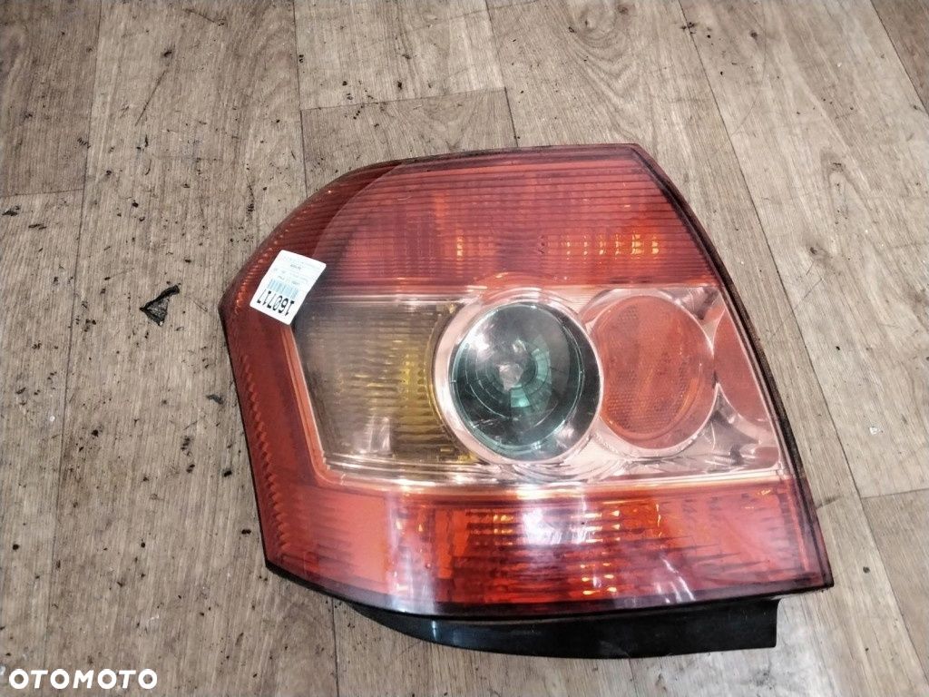 TOYOTA COROLLA E12 LIFT LAMPA TYŁ PRAWA - 1