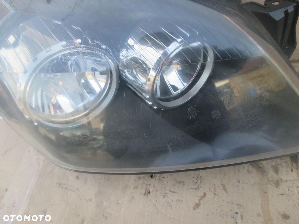 lampa prawa Opel Astra 3 H Hella Europa - 5