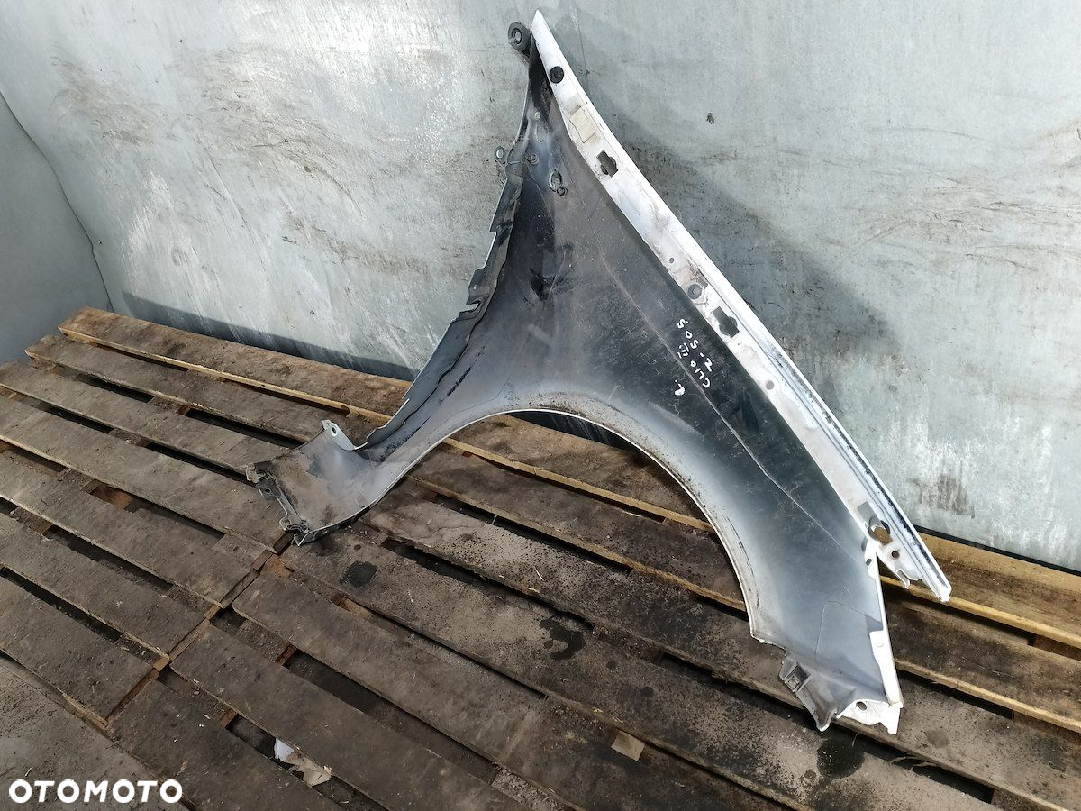 BŁOTNIK LEWY PRZÓD RENAULT CLIO III FL (09-13) 8200256117 - 6
