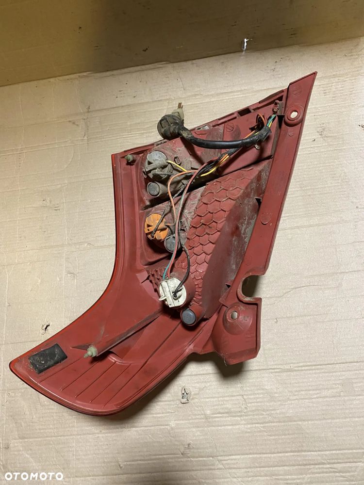 Lampa Suzuki Swift MK6 lift 08-10r lewa tył - 2