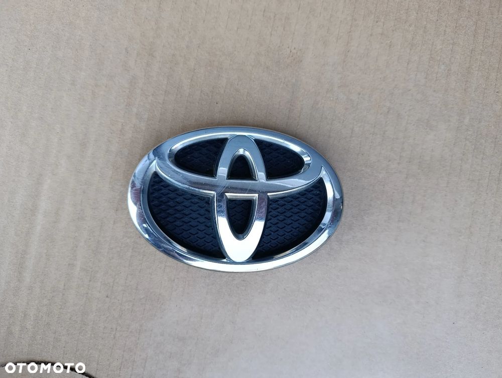 TOYOTA YARIS II 2 EMBLEMAT ZNACZEK CHROM PRZÓD 75311-0D030 - 1