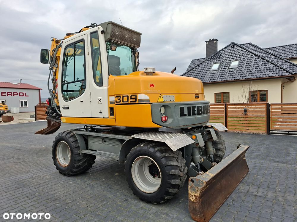 Liebherr A309 ROTOTILT - 2