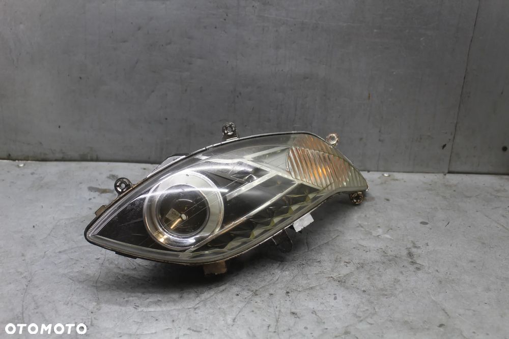 Sym Maxsym 400 600 Lampa przód przednia reflektor - 4