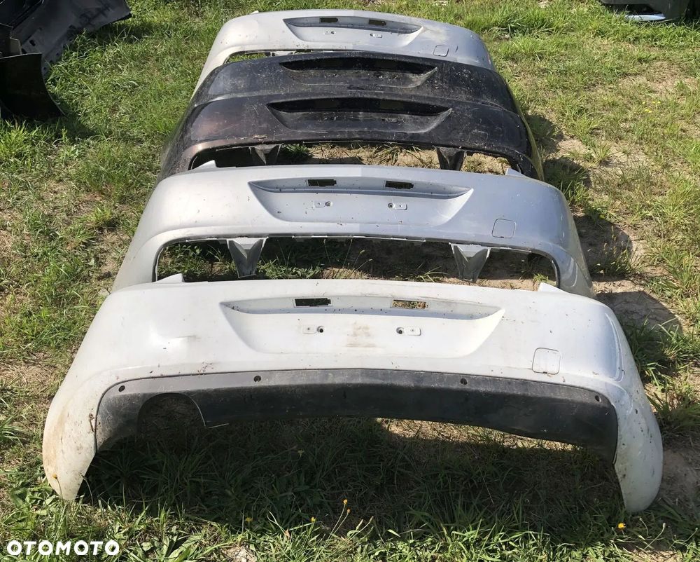 OPEL ASTRA J IV K V SEDAN 4D 2010- ZDERZAK TYLNY TYŁ DOKŁADKA SPOILER HOKEJ DYFU - 1