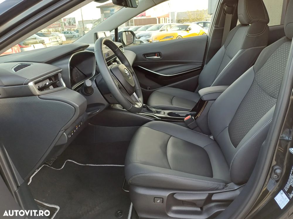 Toyota Corolla TS 1.8 HSD Exclusive - 11