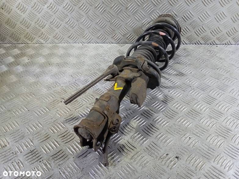 AMORTYZATOR LEWY PRZEDNI SPRĘŻYNA MAZDA 2 - 2