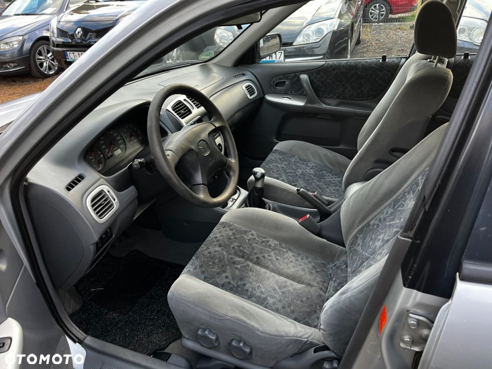 Mazda 323F 1999 photo 4