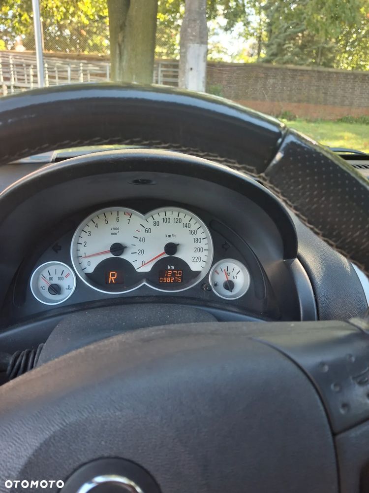 Opel Corsa 1.2 16V Enjoy Easytronic - 1