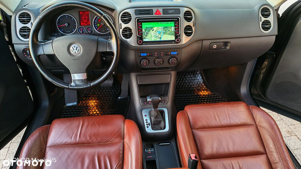 Volkswagen Tiguan 2.0 TDI DPF 4Motion DSG Exclusive - 1