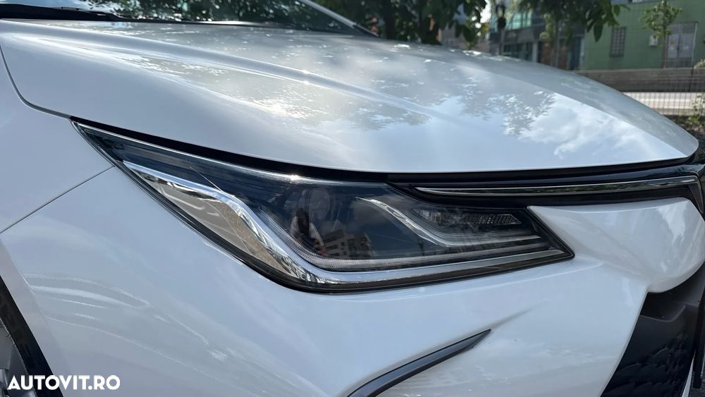 Toyota Corolla 1.8 HSD Business - 31