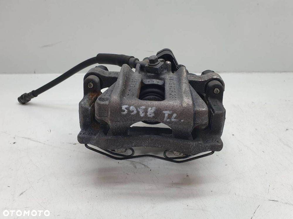 ZACISK HAMULCOWY TYŁ TYLNY LEWY JARZMO SKODA OCTAVIA IV LIFT 2.0 TDI - 2