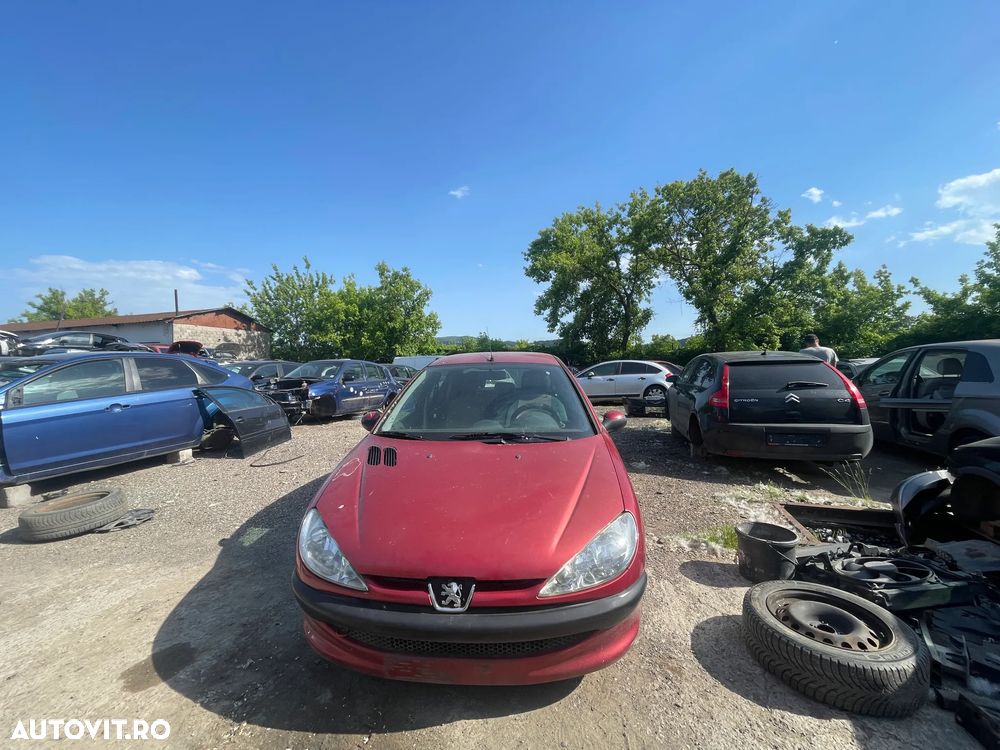 Dezmembrez Peugeot 206 1.4 KFV 55kW 75Cp Facelift rosu an 2006 - 2