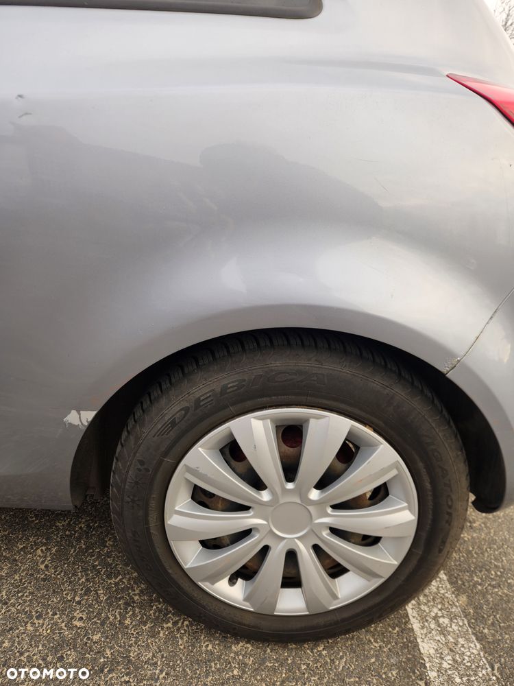 Opel Corsa 1.4 16V Enjoy - 11