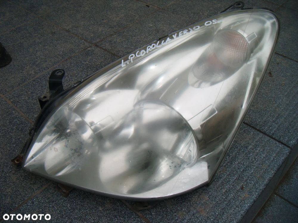 toyota corolla verso 05r lampa lewy przód - 1