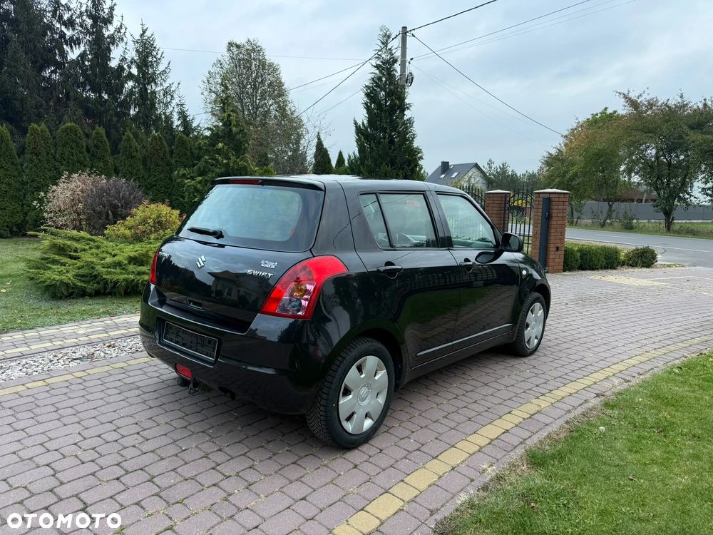 Suzuki Swift 2009 photo 2