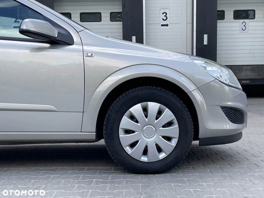 Opel Astra 1.8 Caravan - 14