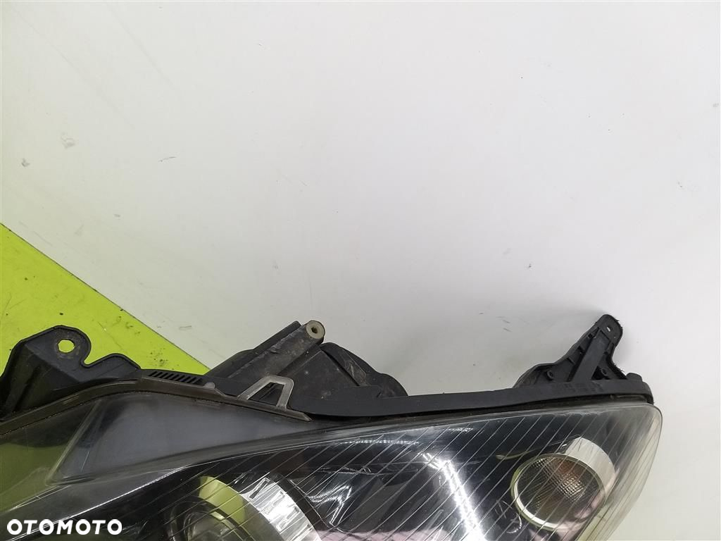 Reflektor lampa przód lewa Opel Astra  III H PRZED LIFT 2004-2006 XENON - 9
