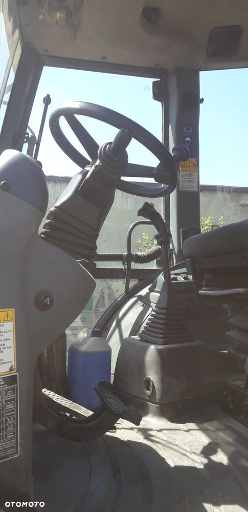 New Holland 110B - 13