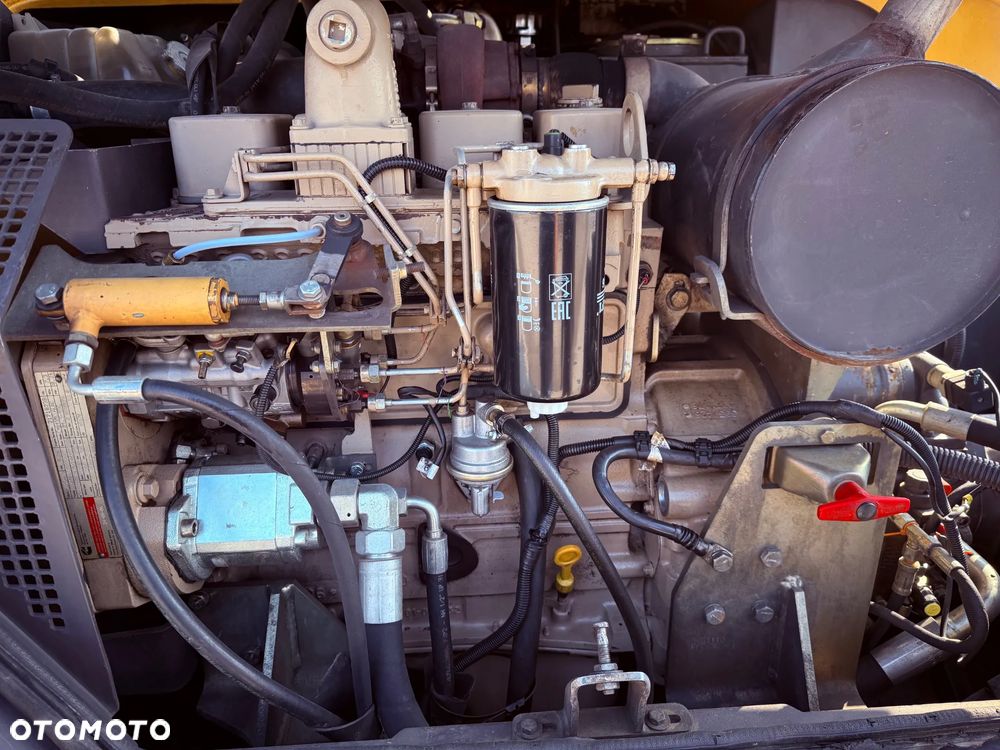 Mecalac 12MTX /2006/ Komplet Łyżek 6szt - 25