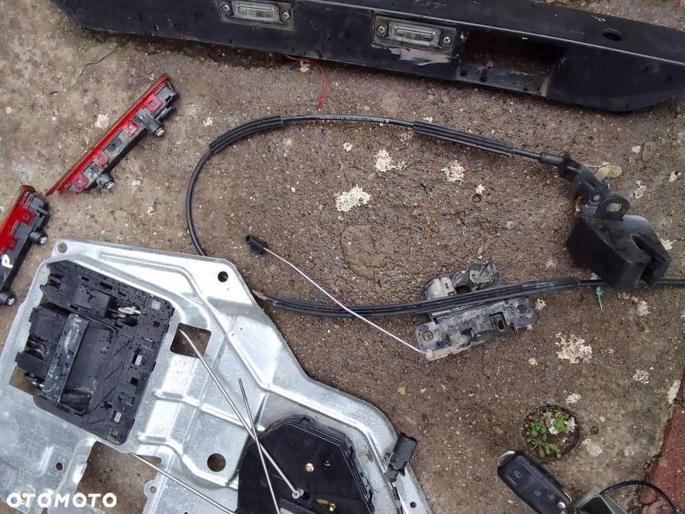 VW T5 ZAMEK WKŁADKA KLUCZYK DRZWI SKRZYDEŁKA TYLNE LEWE KOMPLET - 1