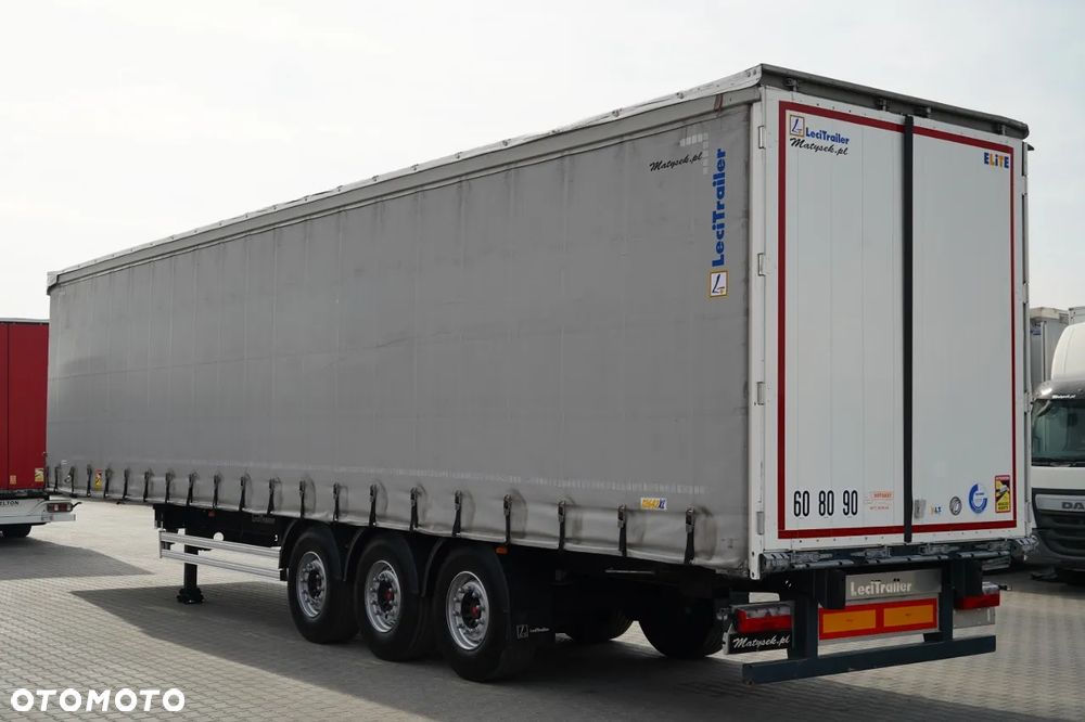 LeciTrailer FIRANKA / STANDARD / MOCNA PODŁOGA SZYNA DESKA / OŚ PODNOSZONA / OPONY 100%  / OSIE SAF - 6