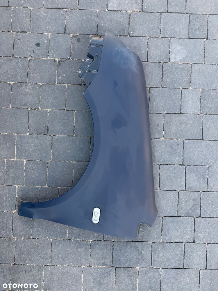 BŁOTNIK LEWY VOLKSWAGEN POLO 9N OKULAR LB5N