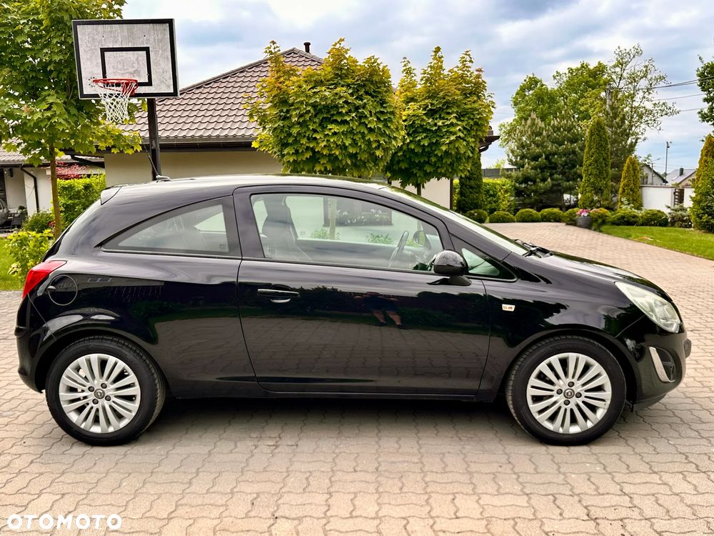 Opel Corsa 1.2 16V Cosmo - 11