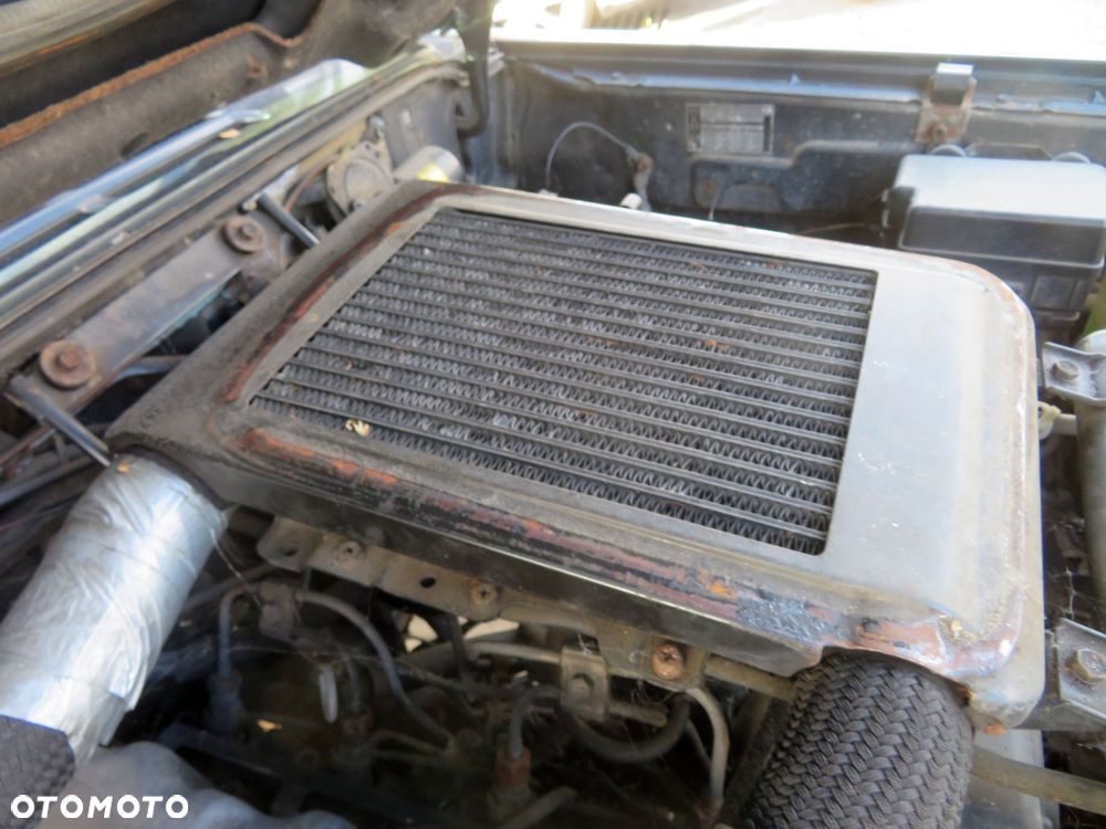 CHŁODNICA INTERCOOLER GALLOPER II LIFT 2.5 TD HR140170A HR805800 HYUNDAI 1998-2003 - 1