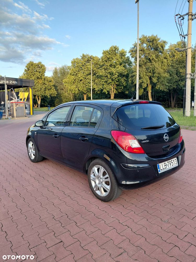 Opel Corsa 1.4 16V Active - 4
