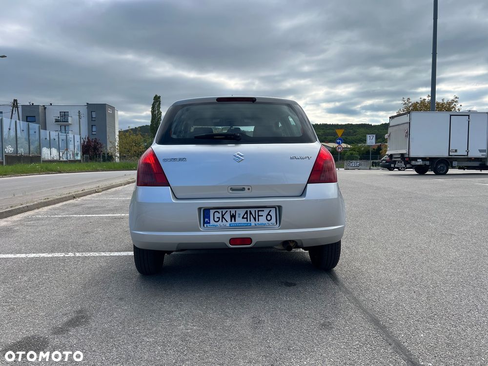 Suzuki Swift 1.3 Club - 7