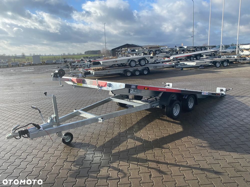 Lorries DOSTAWA! Przyczepa Laweta PLI27-4521 wym. 450x201cm Przyczepa do przewozu aut, UCHYLNA! Zintegrowane najazdy, FULL LED, 2 osie, podłoga aluminiowa DMC 2700kg - 14