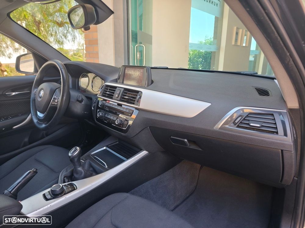 BMW 116 i Advantage — fotografia 20