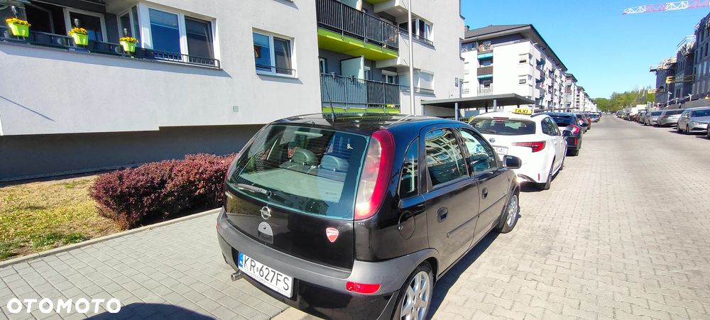 Opel Corsa 1.2 16V Enjoy - 8